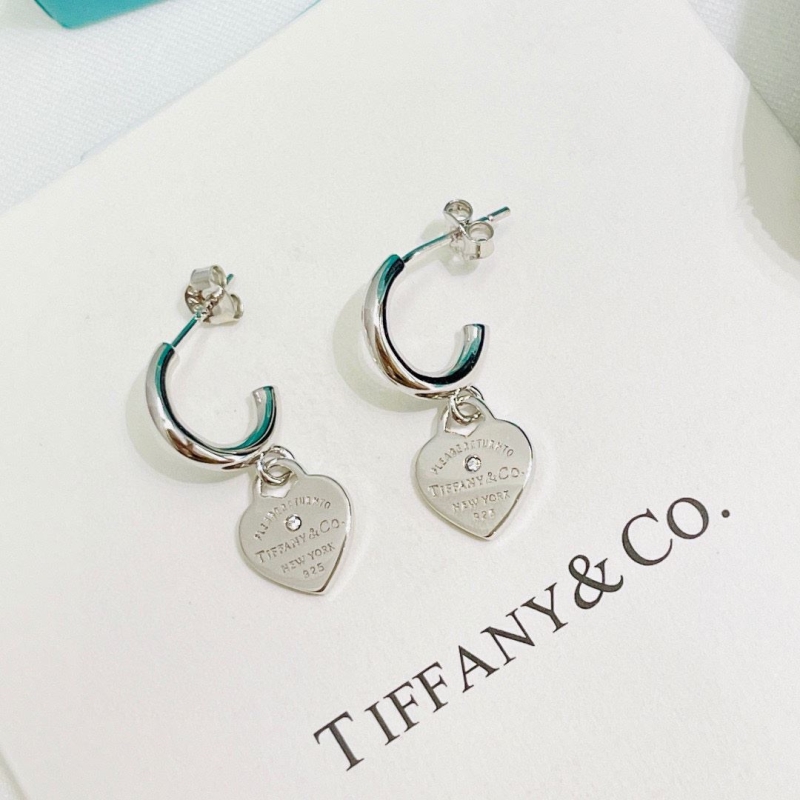 T*f*ny earrings